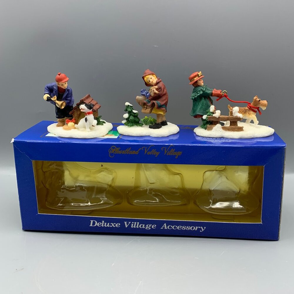 Heartland Valley Christmas Village set of 3 Figurines Kids with Dogs